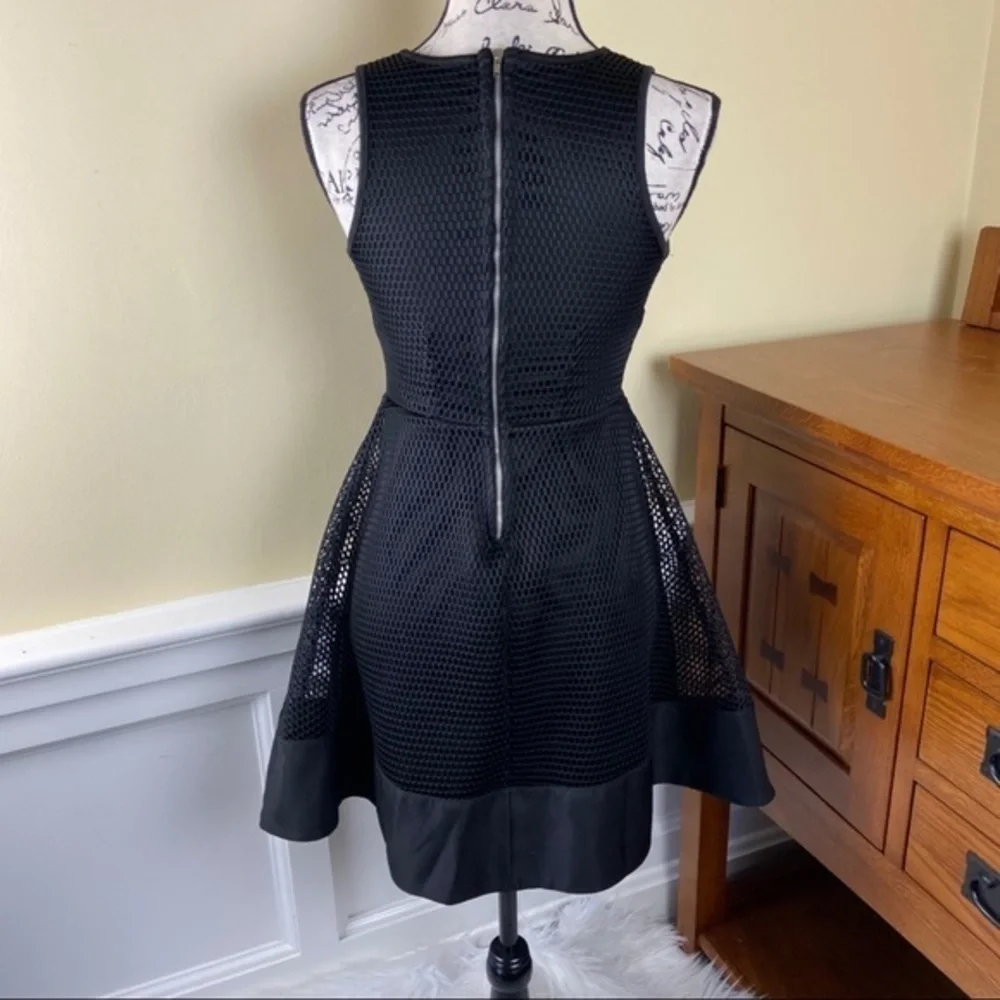 Romeo & Juliet Couture Solid Mesh Hollowed Sleeveless Dress - Picture 4 of 8